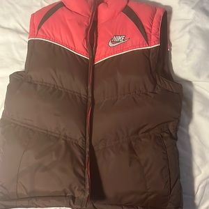 This is a Nike puffer coat sleeveless.